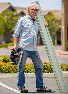 Arnim Huber with his handyman tools in a neighbourhood in San Diego